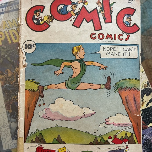 comic Other - Collectible Comics. 1959 Comic Comics. And Elvira comic.  In fair confition..